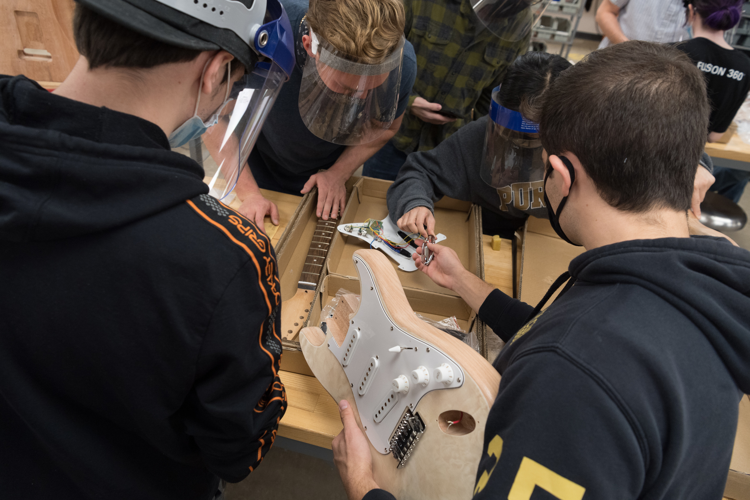 Students in Professor Mark French's guitar class