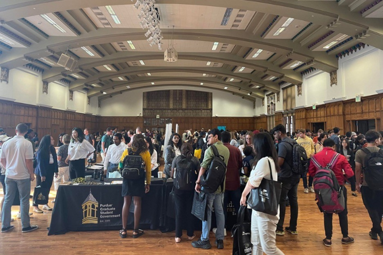 Students visiting resource fair tables